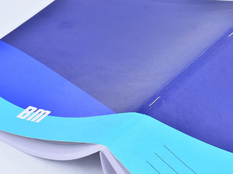Saddle stitched notebook with wire staples on the fold