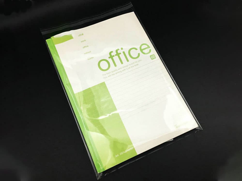 Notebook packed in OPP bag for export
